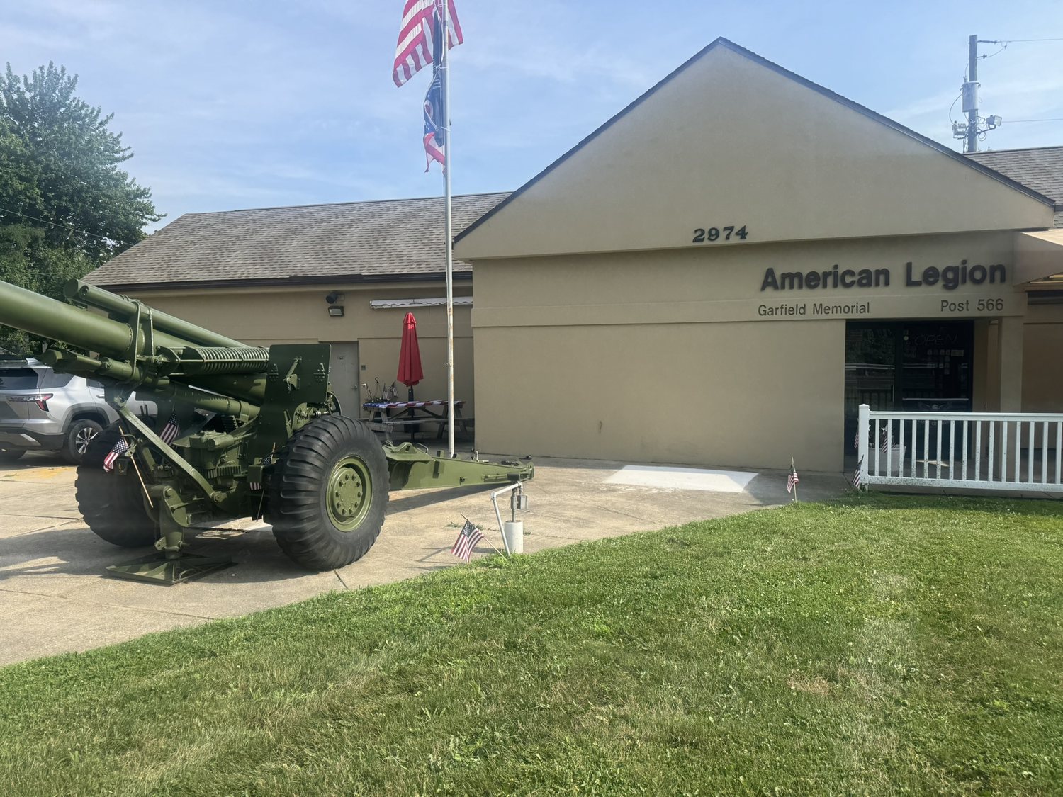 American Legion Garfield Memorial Post 566 on Cormany Road, with the flag flying beside the Post howitzer